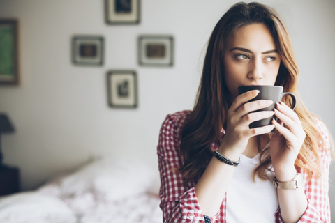 woman drinking coffee to lower depression risk