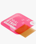 Pink packaging of an oral strip with a red strip inside on a white background